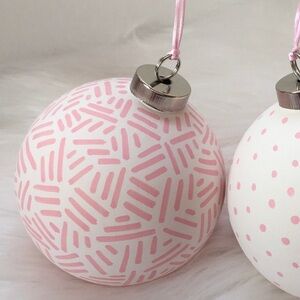 Set of 2 ceramic ornaments pink white
